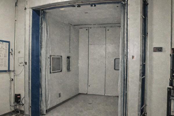 Professional spray booth facility with climate control and filtration systems