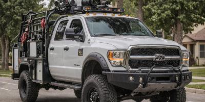 Custom utility truck modification with specialized equipment mounting